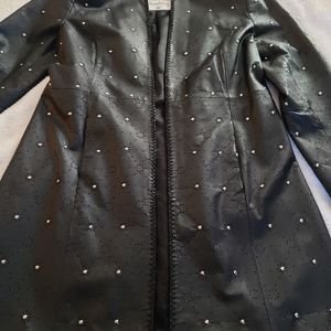 Black leather jacket with silver studs.